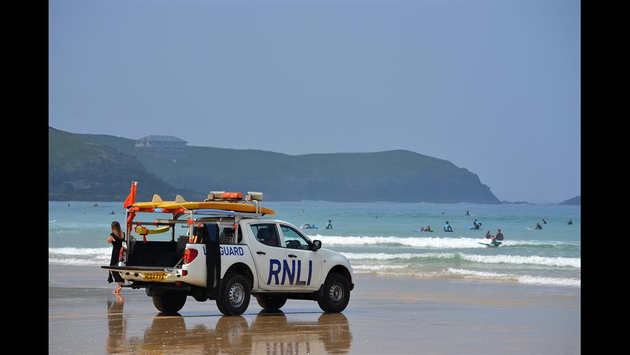 RNLI lifeguard patrol truck at Fistral