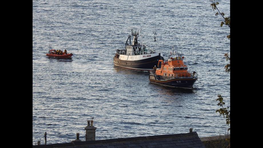 Prosperity UL 250 being towed in to Macduff Harbour by Buckie lifeboat with Macduff lifeboat astern