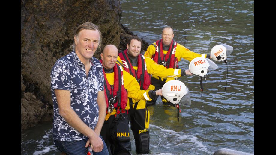 Rescued swimmer Michael Power with Tramore RNLI David McGrath, Alec Fitzmaurice and Fergal McGrath