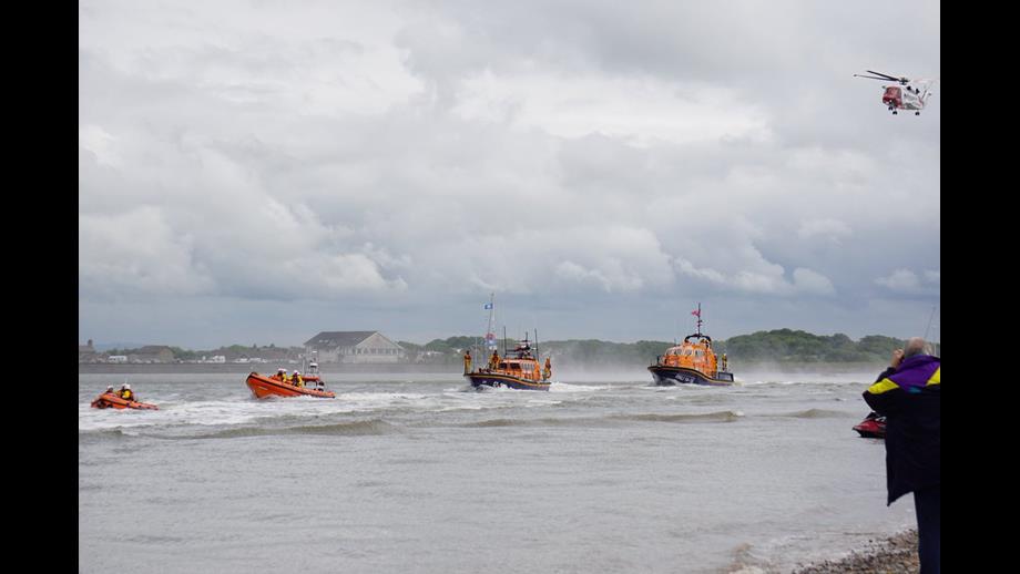 RNLI Lifeboats from Fleetwood's flank stations at Blackpool, Lytham and Barrow are joined by HM Coastguard helicopter in the Grand Parade.