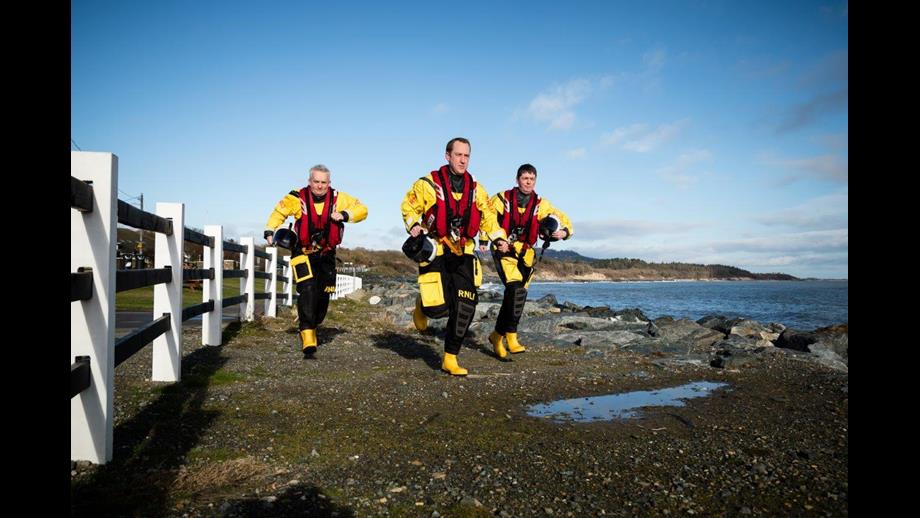 Three crew run to a shout