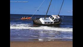 The yacht only meters from the beach