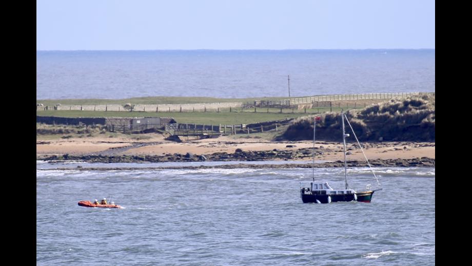 The considerably larger vessel towed to safety by the D class lifeboat
