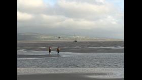 Cricceth RNLI Crew-member walking towards the yacht