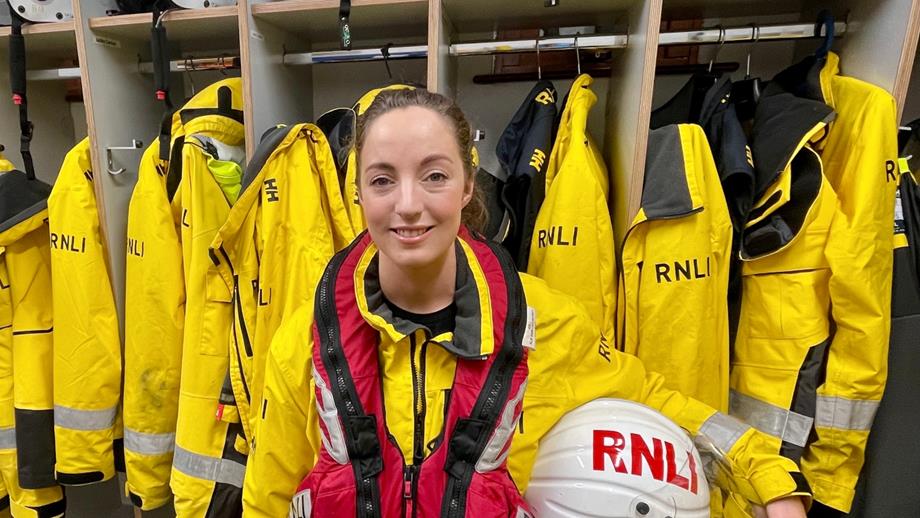 Red Bay crew member, Hazel Imrie, standing in lifesaving kit