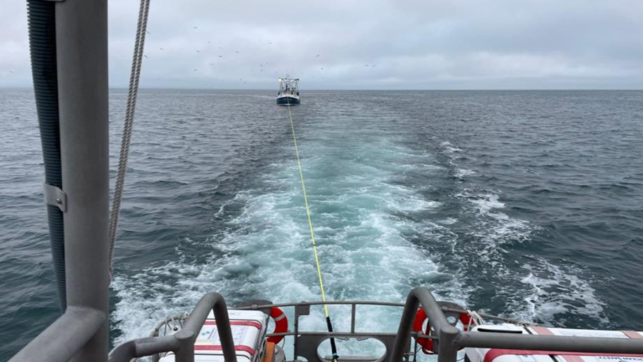 Trawler being towed by the Red Bay lifeboat