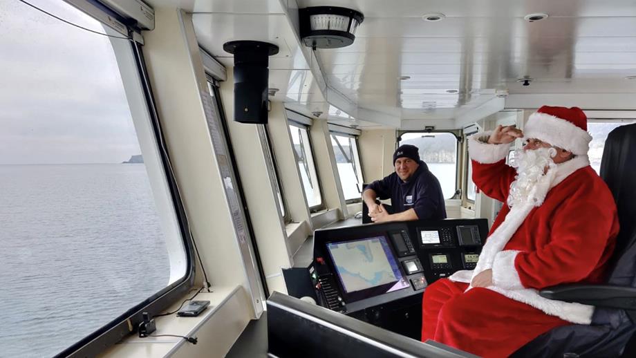 Santa looking out to sea from the bridge of the Rathlin ferry