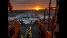 Tobermory RNLI tows motor boat with fouled propellor at sunset