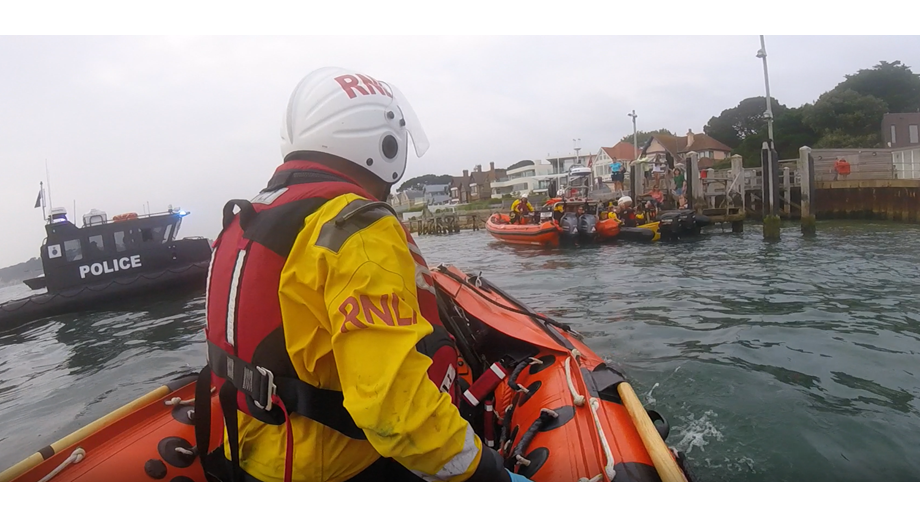 RNLI crew on front of the lifeboat 