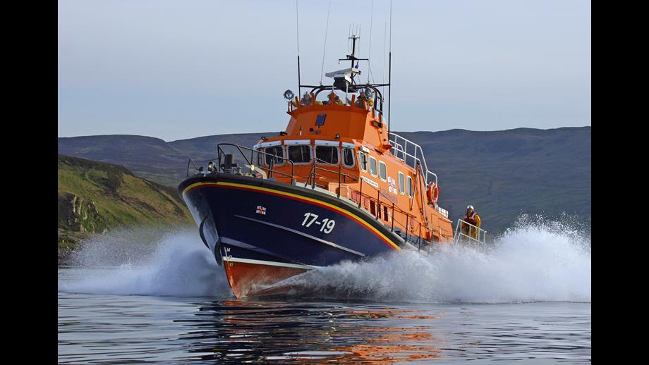 Campbeltown Severn class lifeboat Ernest and Mary Shaw 17-19, lifeboat moving from right to left, lots of white spray.