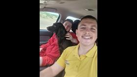 RNLI lifeguards Owain and Peter with dog Coco after the rescue