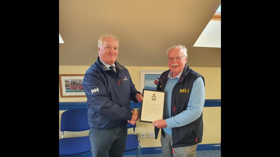 CE Mark Dowie present Lough Swilly RNLI award to LOM John McCarter