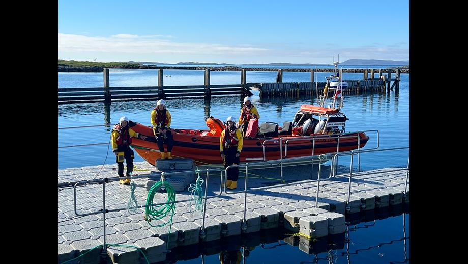 Lifeboat on versadock with helm and 3 crew