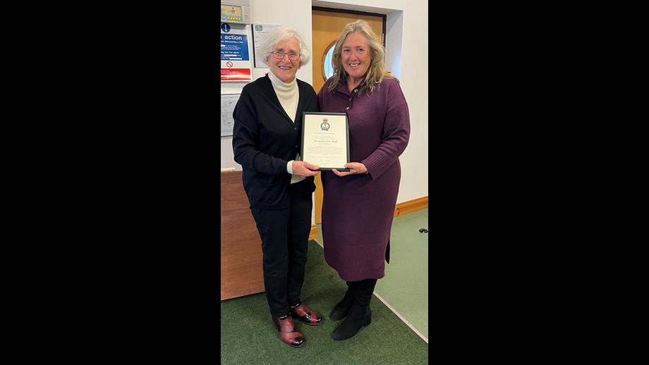 Alexandra Van Tuyll received her RNLI Certificate of Thanks from RNLI Head of Region Anna Classon