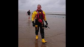 Karl Price wearing full ILB PPI on the beach at Flamborough