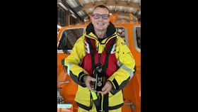 Shoreham Lifeboat second coxswain Simon Tugwell with his 40-year service medal
