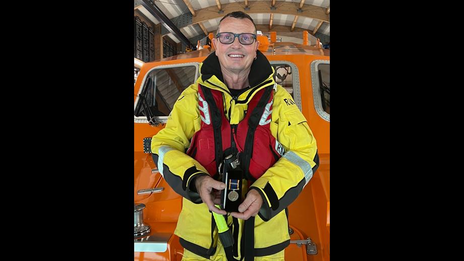 Shoreham Lifeboat second coxswain Simon Tugwell with his 40-year service medal