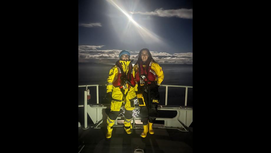 Two female volunteer lifeboat crew members