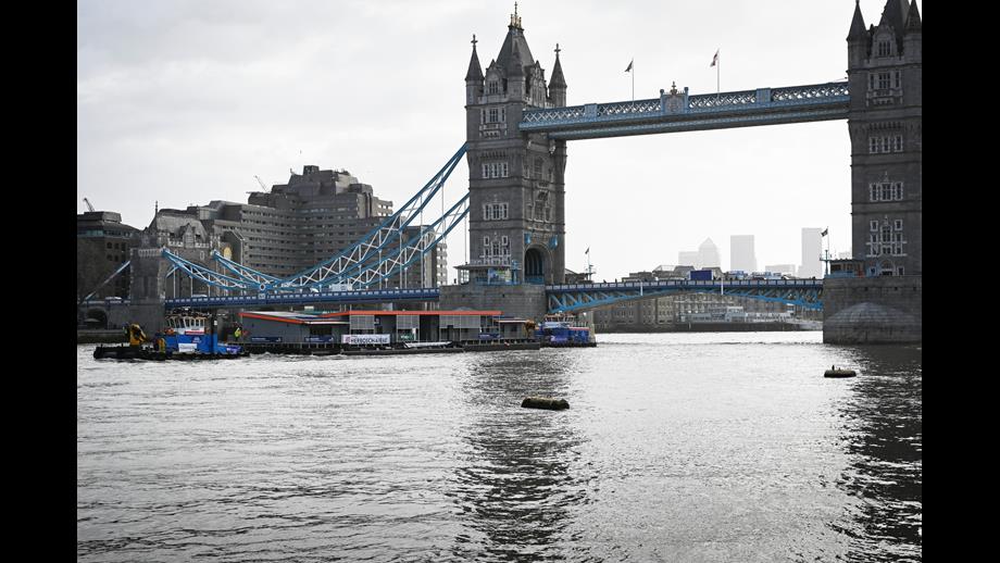 Tower lifeboat station floating under Tower bridge 