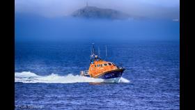 Sennen Cove's Tamar class lifeboat 'City of London III returning to station following a launch last year .