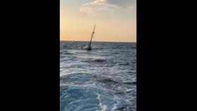 Walton and Frinton Lifeboat towing yacht back to safety