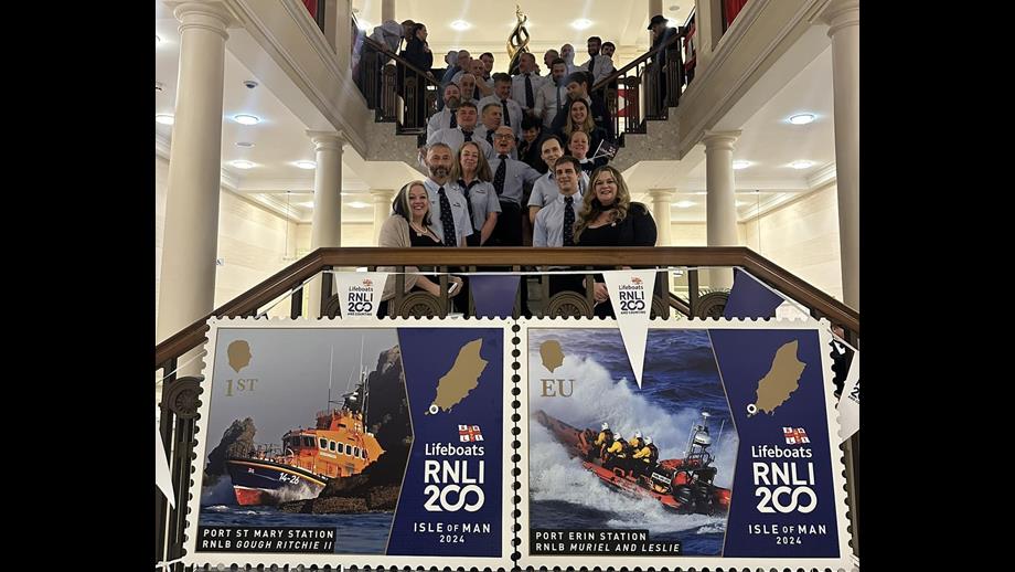 RNLI volunteers from all five lifeboat stations stood together. 