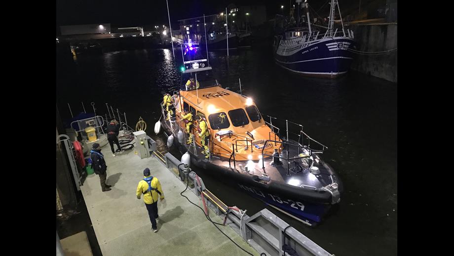 Eyemouth RNLI volunteer crew launch the all-weather lifeboat go to the aid of a stricken fishing boat