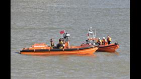 Tower and Gravesend's orange lifeboats afloat
