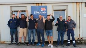 Seven of our volunteer crew who will be doing the Beast Race, stood in front of the temporary crew shed