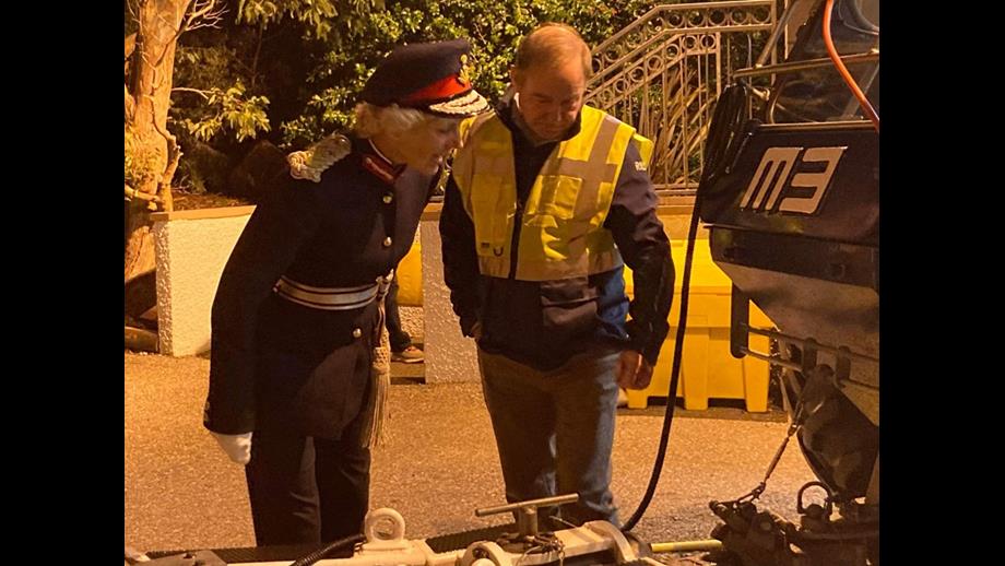 Jake Scott shows Lord Lieutenant how the trailer attaches to the tractor
