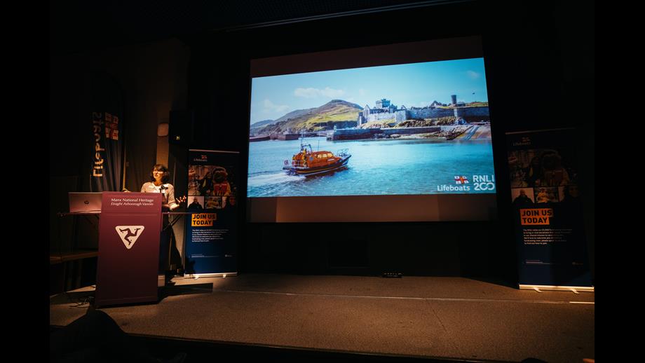 Anjie Rook RNLI Associate Director - Fundraising Marketing and Media delivering a presentation on the RNLI 200 campaign