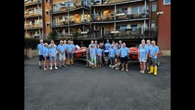 Crew members with lifeboats