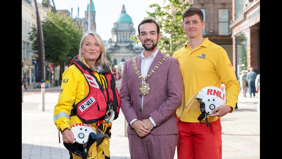 Donaghadee lifeboat volunteer Nicky Butler and Lifeguard Adam Cummings with Belfast Lord Mayor, Cllr. Micky Murray
