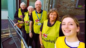 5 RNLI Volunteers In RENLI Yellow bibs