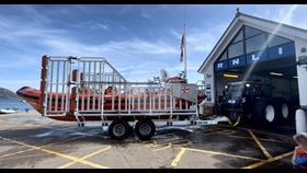 Tractor and boat outside the Arran RNLI Lifeboat Station