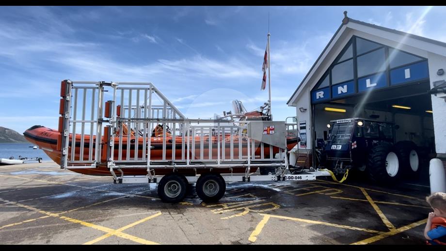 Tractor and boat outside the Arran RNLI Lifeboat Station