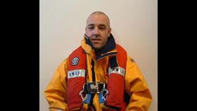 A lifeboat crew member in lifejacket 