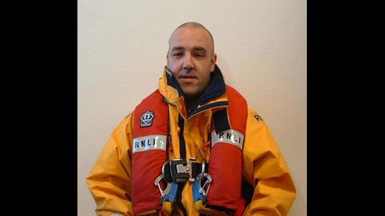 A lifeboat crew member in lifejacket 