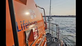 Lowestoft RNLI relief lifeboat towing the stranded yacht with gear box failure