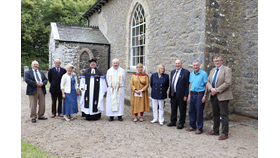 RNLI volunteers and clergy standing outside Killodiernan Church following the Service of Thanksgiving
