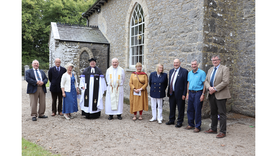 RNLI volunteers and clergy standing outside Killodiernan Church following the Service of Thanksgiving