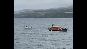 Peel lifeboat towing yacht 
