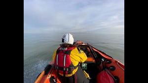 The inshore lifeboat in totally calm seas.