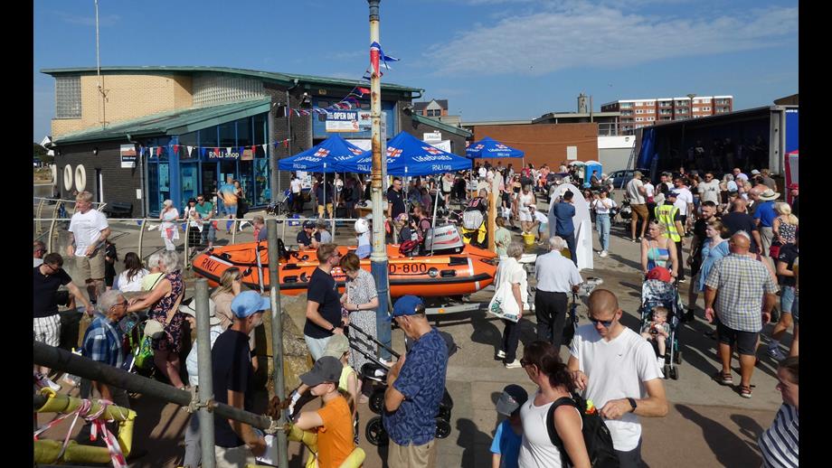 A mass of people crowd round the Lytham St Annes Lifeboat House enjoying themselves on Open Day