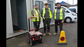 Gigawatt Electrical Services electricians Adam Bradbury-Smith, Reece Hall and Grayson Bennett. outside the two portable buildings
