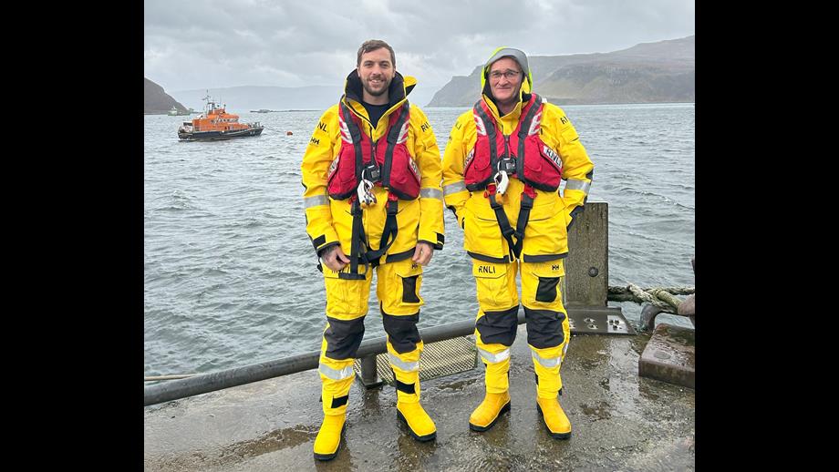 A picture of new mechanic Josh Masson with full time station mechanic John &quot;Clanky&quot; Nicolson and lifeboat Stanley Watson Barker in the background.