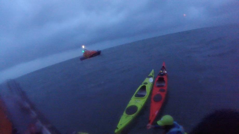 Some of the kayaks, St Davids lifeboat Norah Wortley and coastguard helicopter in the distance.