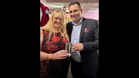 2 people with award
