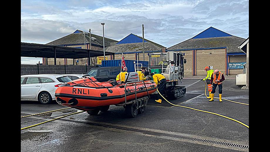 Burnham's D class lifeboat Burnham Reach being washed down after recovery