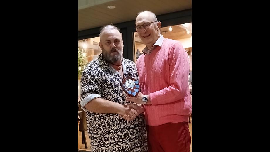 Paul Sloan receiving his Award